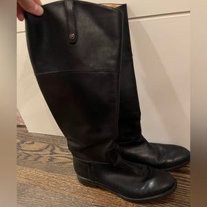 Tall black leather boots